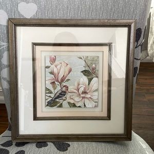 Floral print with bird framed and matted. Colors pale pink and green